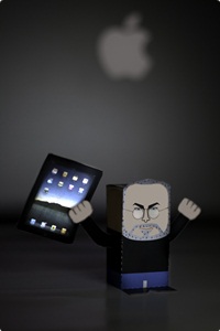 Steve Jobs holding iPad