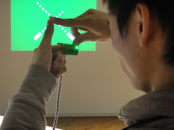Ubi-Camera Turns Your Fingers into the Frame