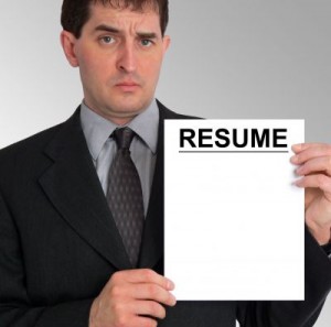 man holding blank resume