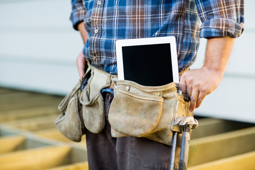 Construction worker with tablet