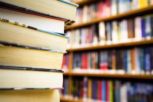 Main image of article Apple Holds Firm as Macmillan Settles With Justice Over E-Books