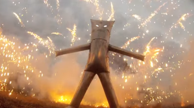 Main image of article Watch This Guy Survive a Fireworks Blast in a Metal Suit