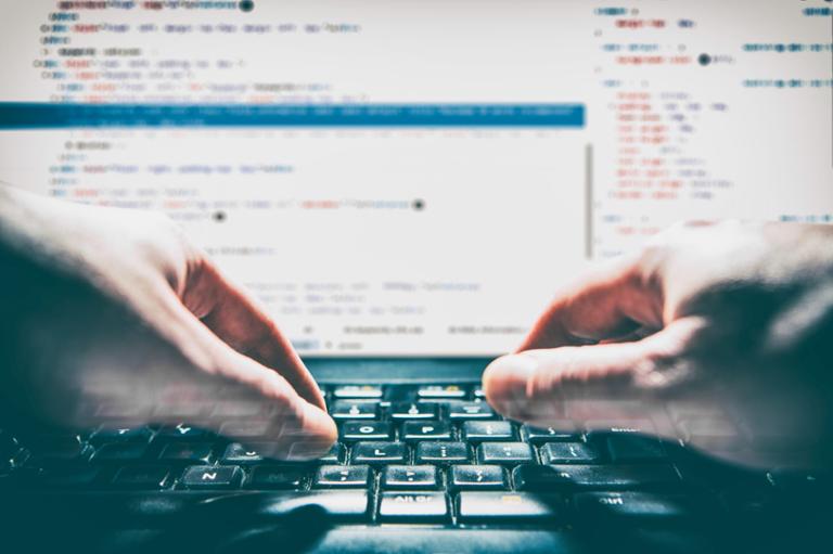 shutterstock_520314349.jpg Main image of article Microsoft, Stack Overflow Bot Helps with Programming