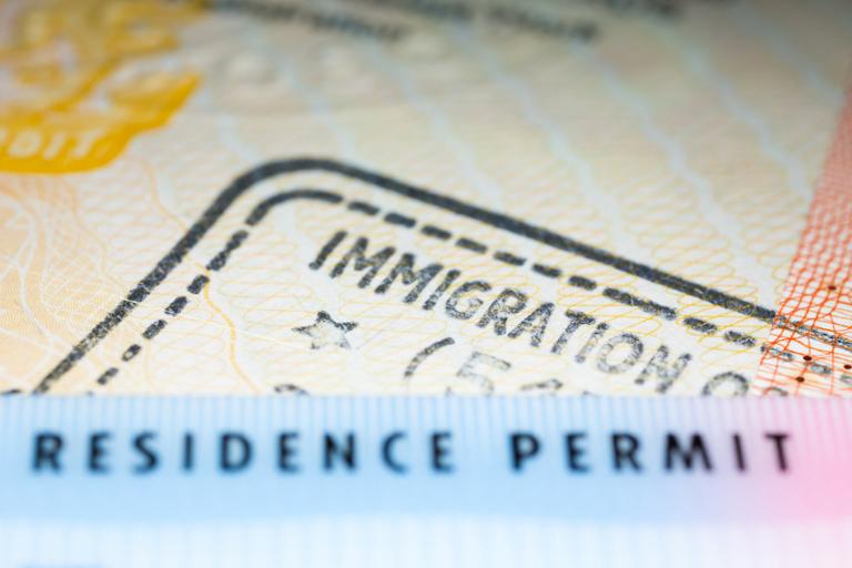 shutterstock_645219262.jpg Main image of article As COVID-19 Rages, USCIS Locks Down Immigration Processes