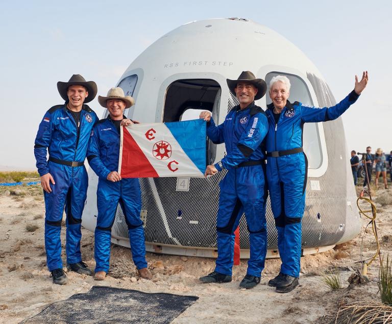 blue-origin-first-human-flight-l0-crew-explorers-club-flag.jpg Main image of article Weekend Roundup: Jeff Bezos Thanks You; Netflix Thinks About Gaming