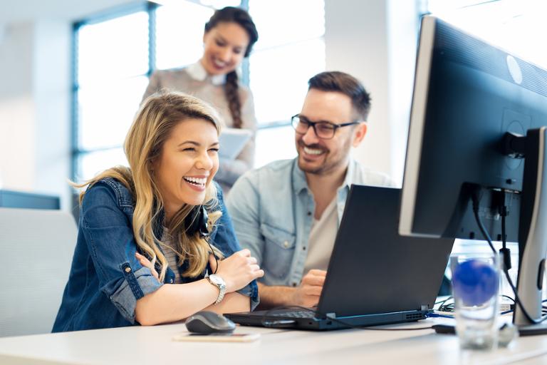 shutterstock_1028183860.jpg Software developer and software engineer working together on a project