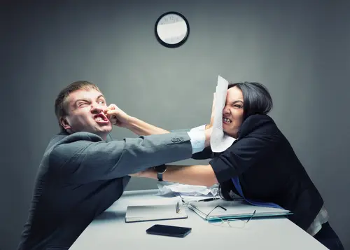 fighting business people