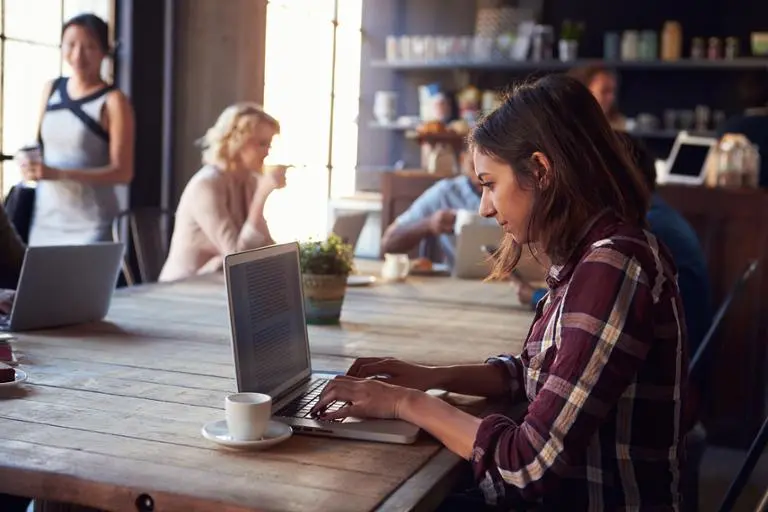 people working in cafe