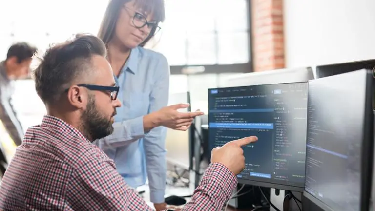 people programming on computers