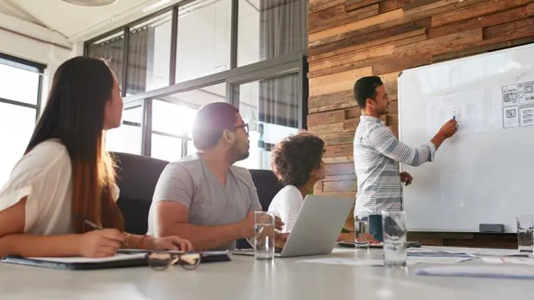 man presenting at business meeting