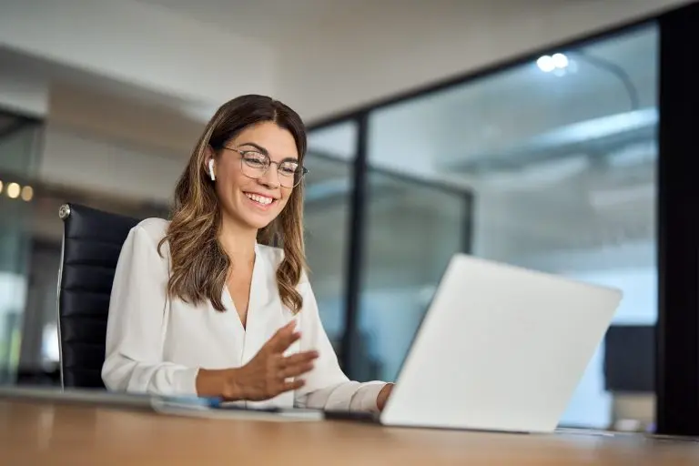 woman using laptop in office