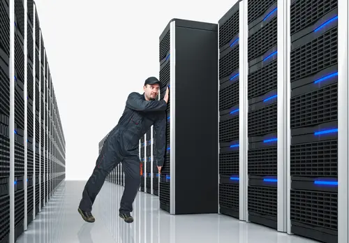 technician inspecting server room racks