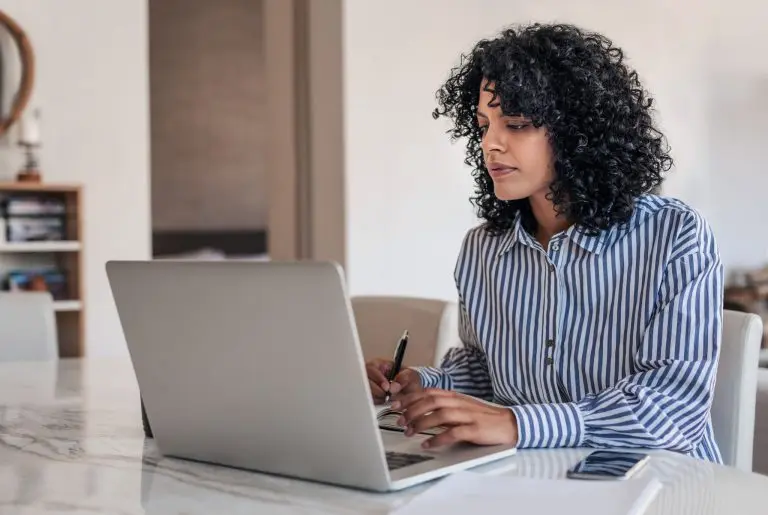 laptop user at desk