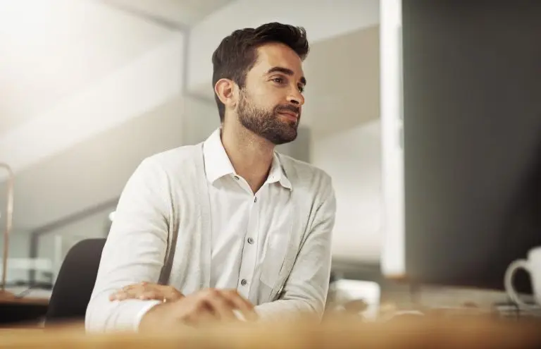 man sitting at desk
