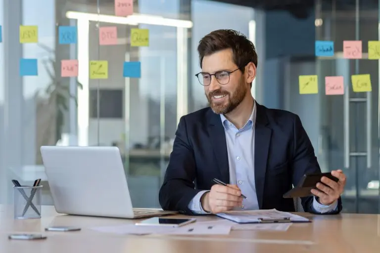 man at office with laptop