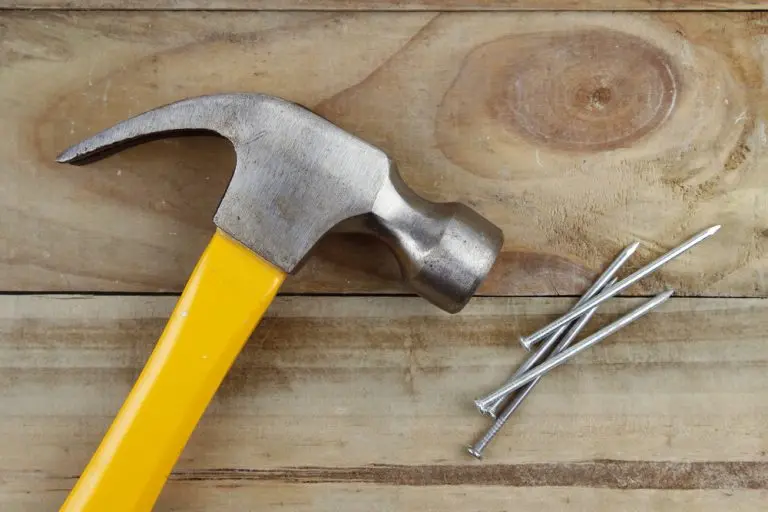 hammer and nails on wood