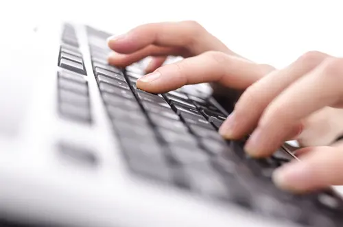 typing on computer keyboard