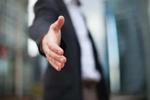 hand extended for handshake