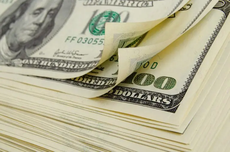 stack of hundred dollar bills