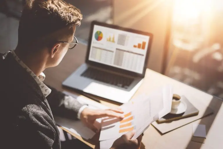 businessman analyzing data charts