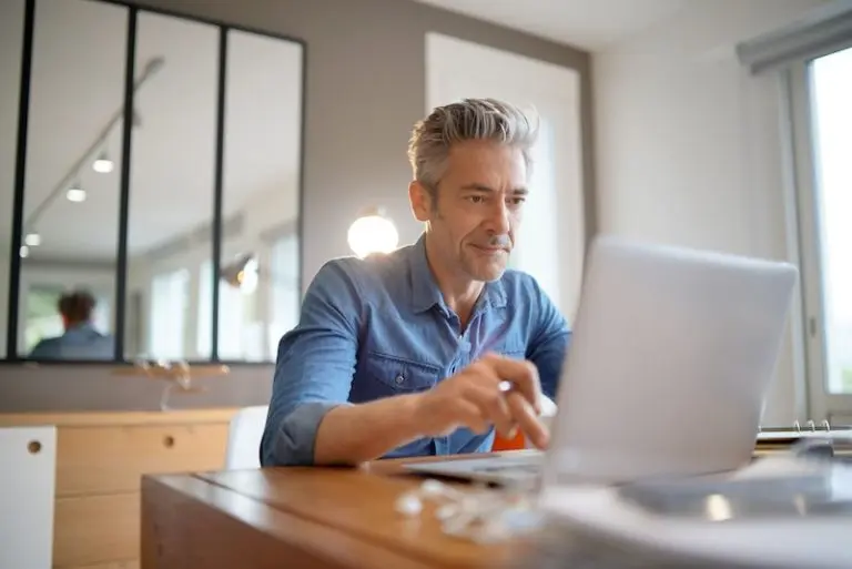 man working on laptop