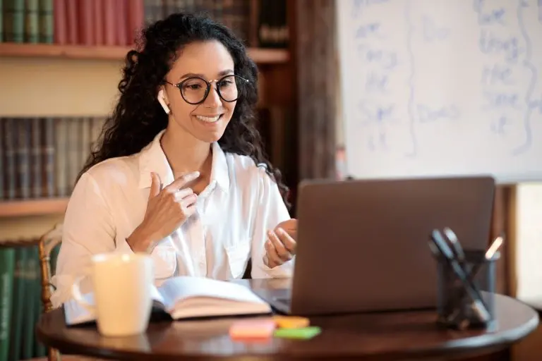 woman video conferencing at laptop