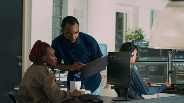 office workers with computer screens