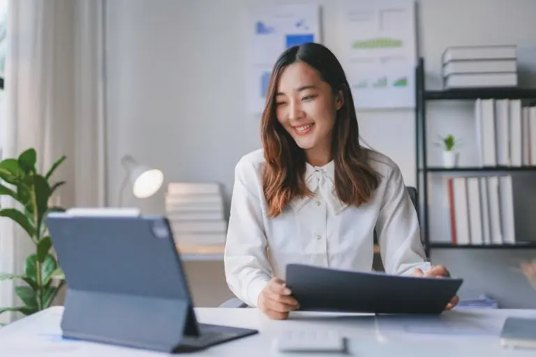 woman working with digital tablet