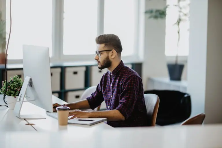 man working at computer