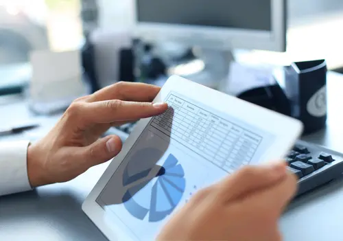 tablet displaying financial chart