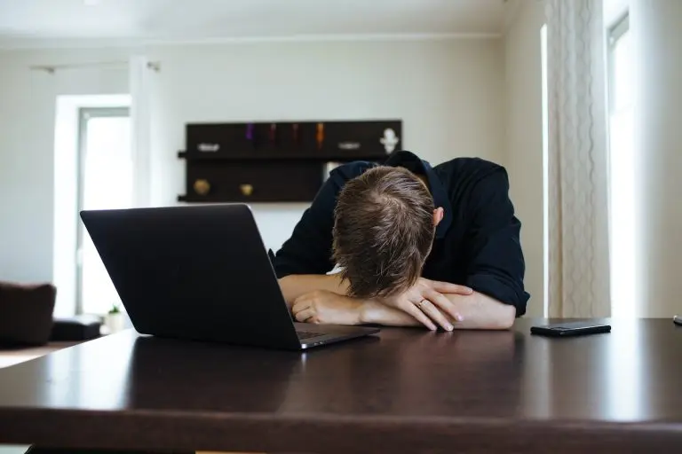 tired person with laptop