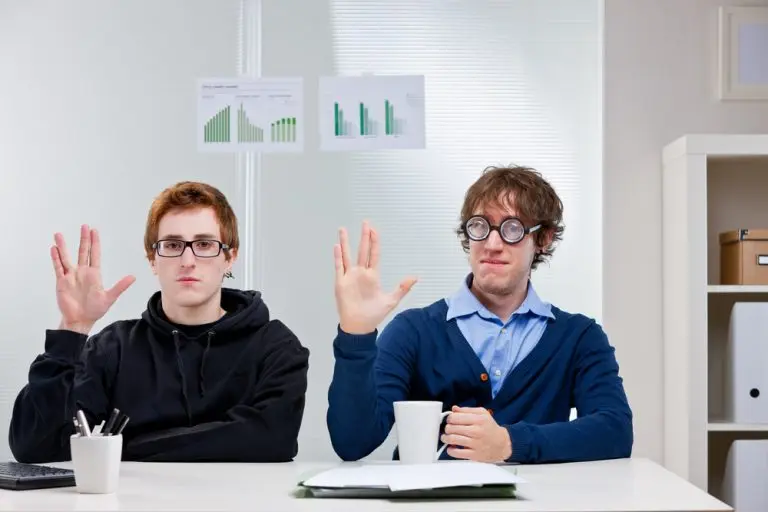 two men doing hand gesture