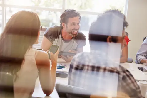 group meeting with laughter