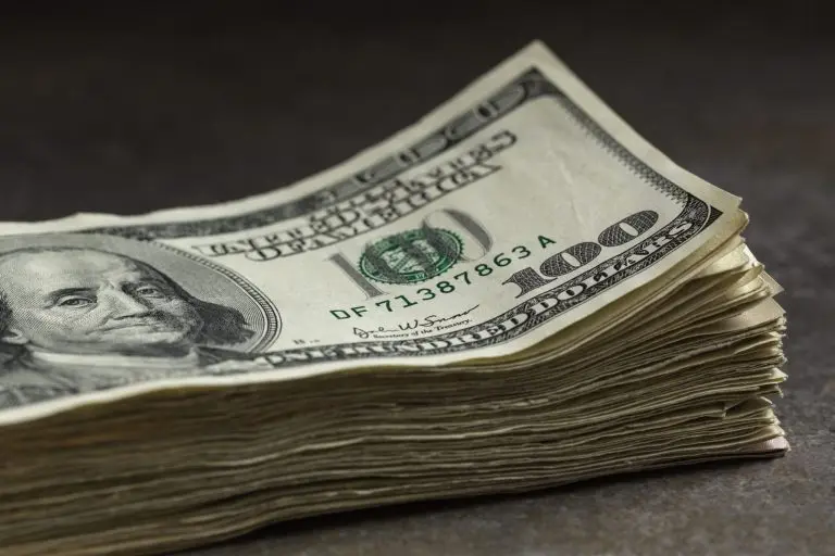 stack of hundred dollar bills