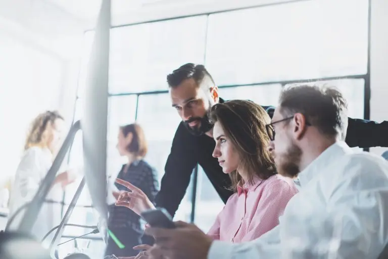 people collaborating in office