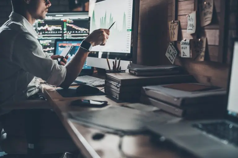 man analyzing data on computer