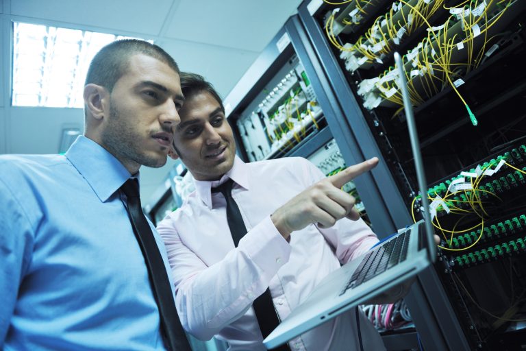technicians working in server room