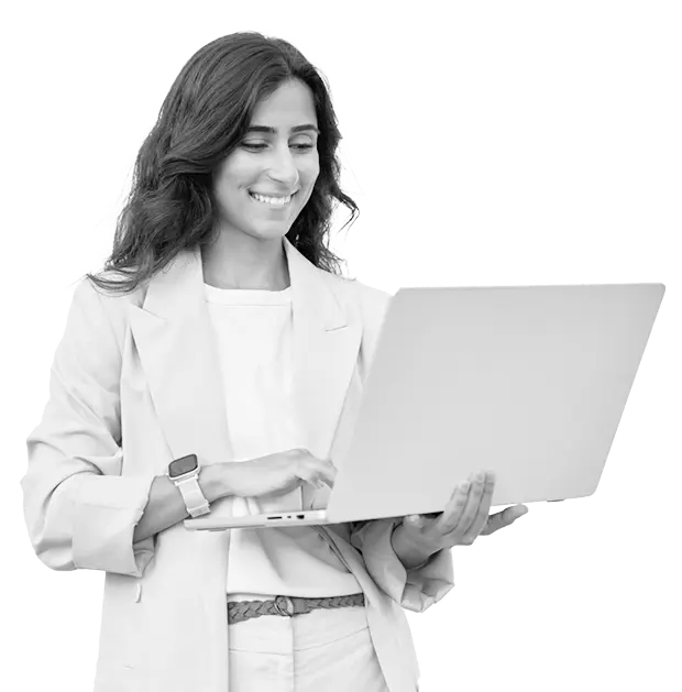 Smiling woman holding a laptop